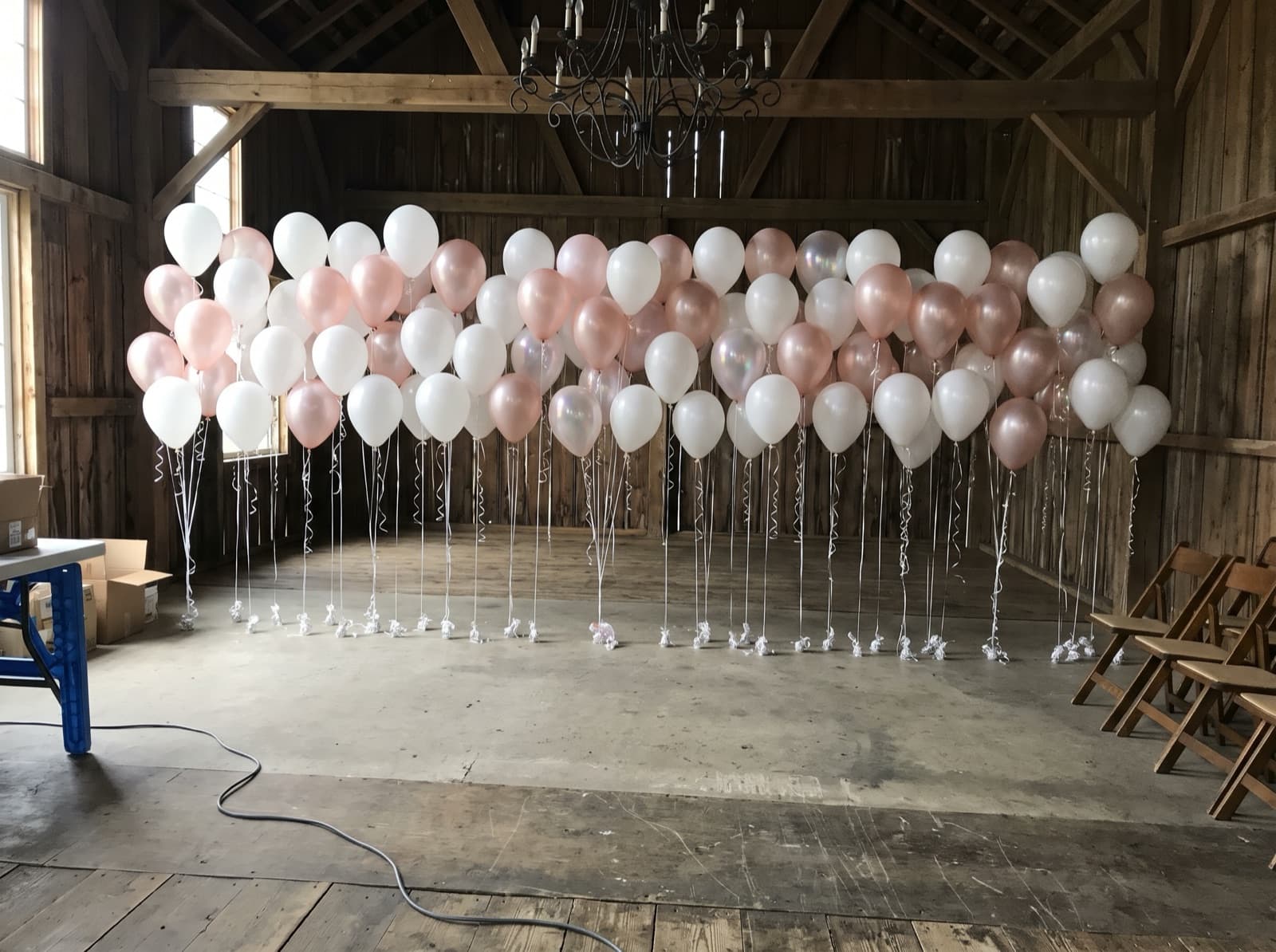 Floating helium balloon wall on ribbons
